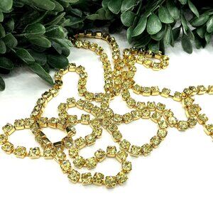 Gold-Tone Long Crystal Necklace With Adjustable Length and Branded Tag